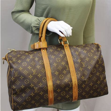 louis vuitton bandouliere keepall|Louis Vuitton Keepall 45 price.